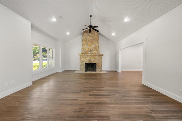 unfurnished living room with vaulted ceiling, a fireplace, and ceiling fan