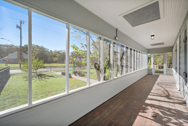 sunroom / solarium featuring a wealth of natural light