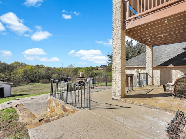 view of patio / terrace with a balcony