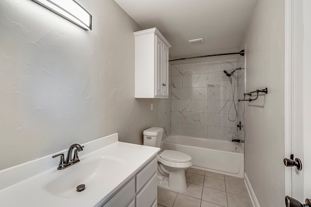 full bathroom with vanity, tile patterned flooring, tiled shower / bath combo, toilet, and a textured ceiling