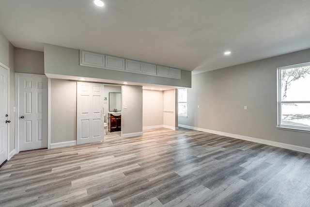 unfurnished bedroom featuring light wood-type flooring