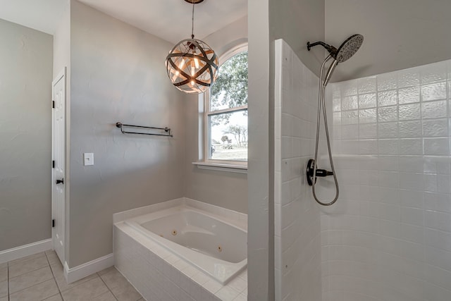 bathroom featuring tile patterned flooring and independent shower and bath