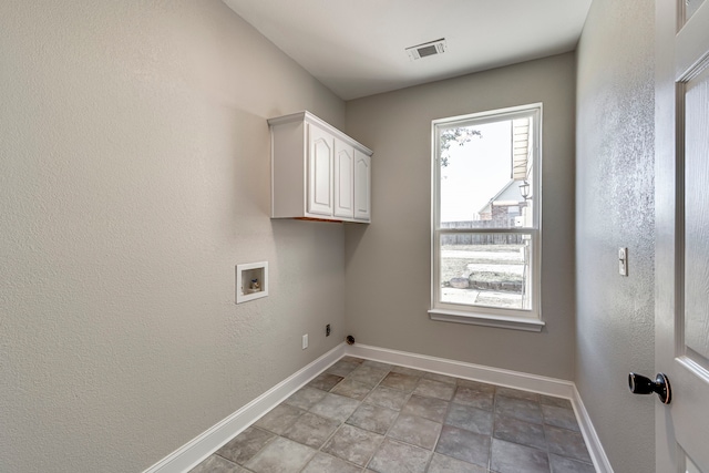 laundry area featuring hookup for a gas dryer, hookup for an electric dryer, cabinets, and washer hookup