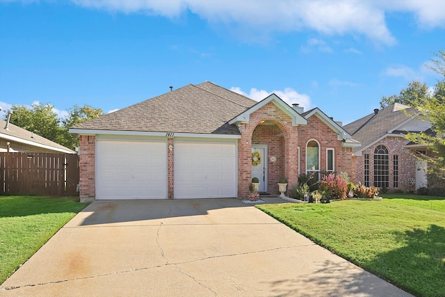 view of front facade with a front lawn and a garage