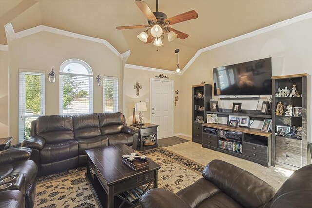 living room with crown molding and vaulted ceiling