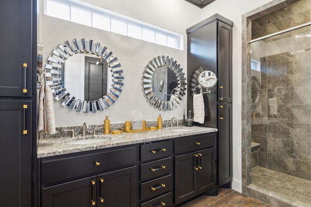 bathroom featuring vanity, wood-type flooring, walk in shower, and ornamental molding