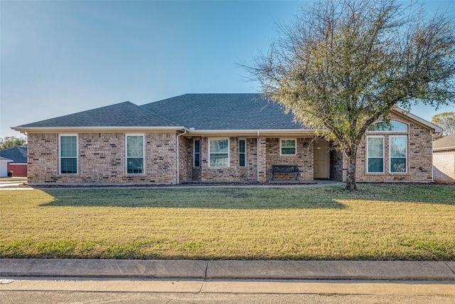 single story home with a front yard