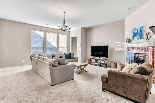 living room featuring light carpet and a notable chandelier