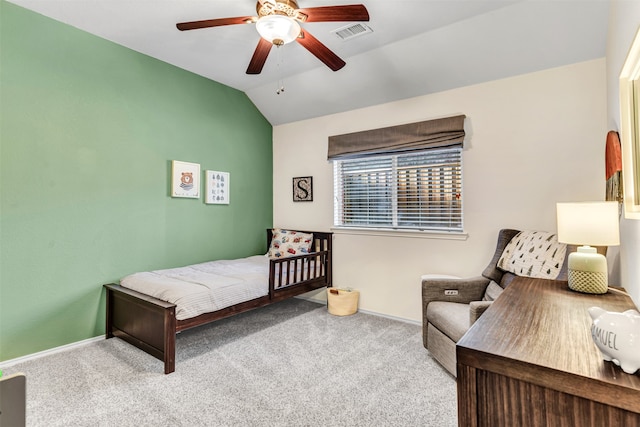 carpeted bedroom featuring ceiling fan and lofted ceiling