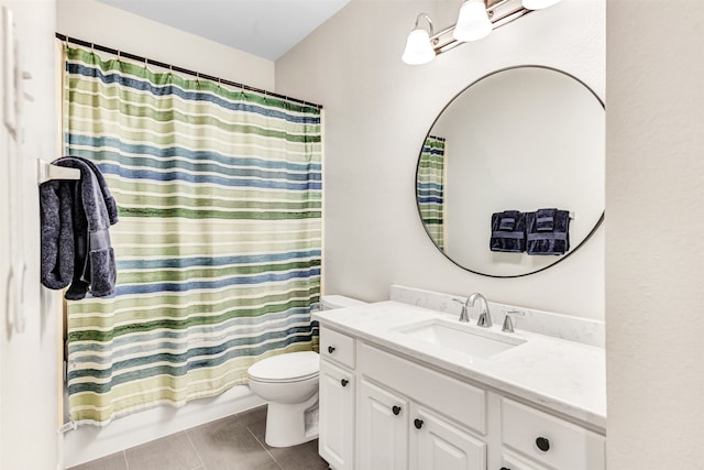 full bathroom with tile patterned floors, vanity, toilet, and shower / bath combo