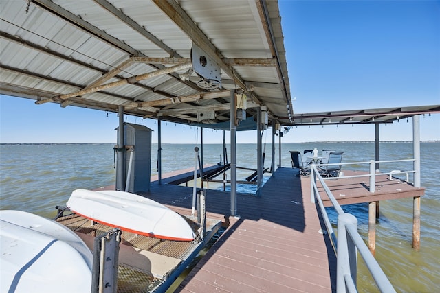 view of dock with a water view