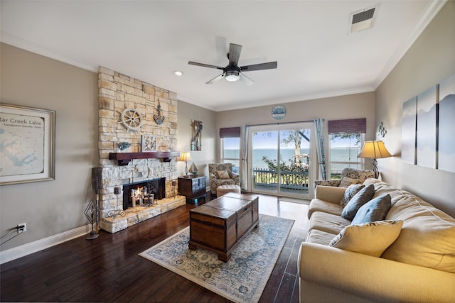 living room with a fireplace, ceiling fan, hardwood / wood-style floors, and ornamental molding