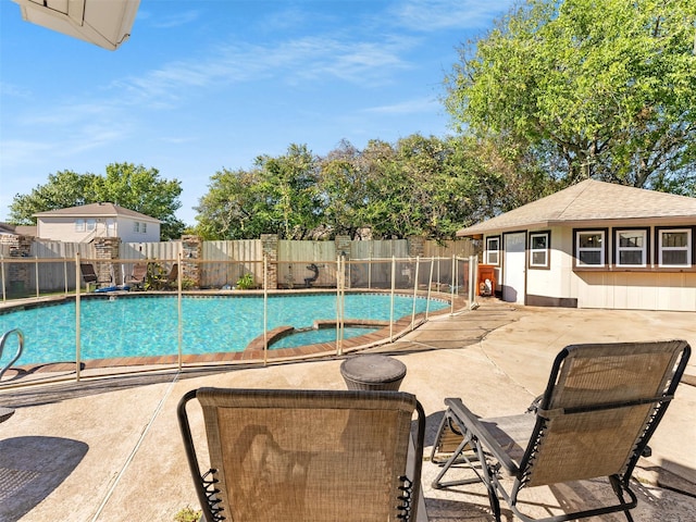 view of pool featuring a patio