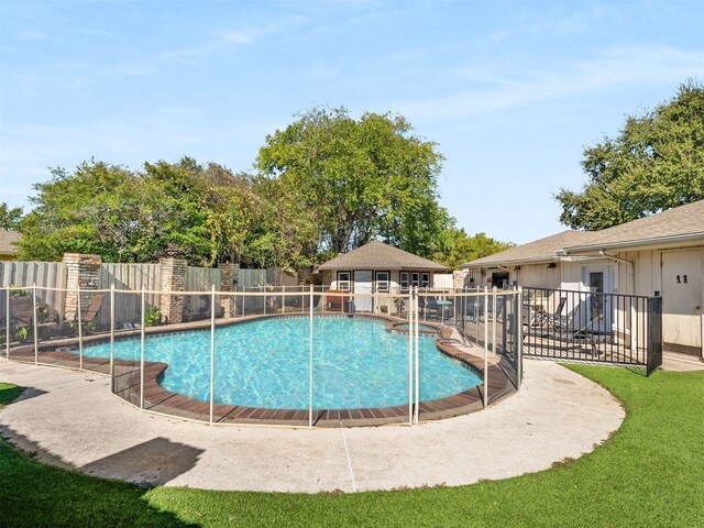 view of swimming pool with a patio