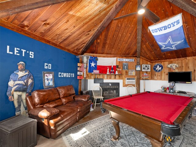 rec room with wooden walls, lofted ceiling with beams, and billiards