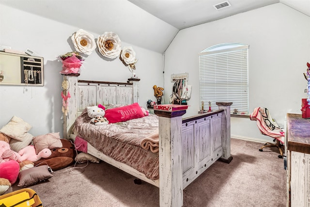 bedroom featuring vaulted ceiling and light colored carpet