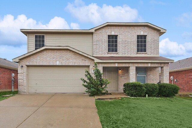 front facade featuring a garage and a front lawn