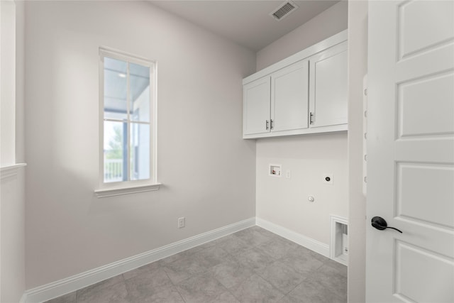 3304 Andesite Rd, Mckinney, TX 75071 - clothes washing area with hookup for an electric dryer, cabinet space, washer hookup, baseboards, and hookup for a gas dryer