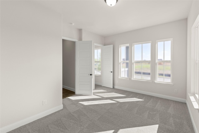 3304 Andesite Rd, Mckinney, TX 75071 - unfurnished bedroom featuring carpet floors and baseboards