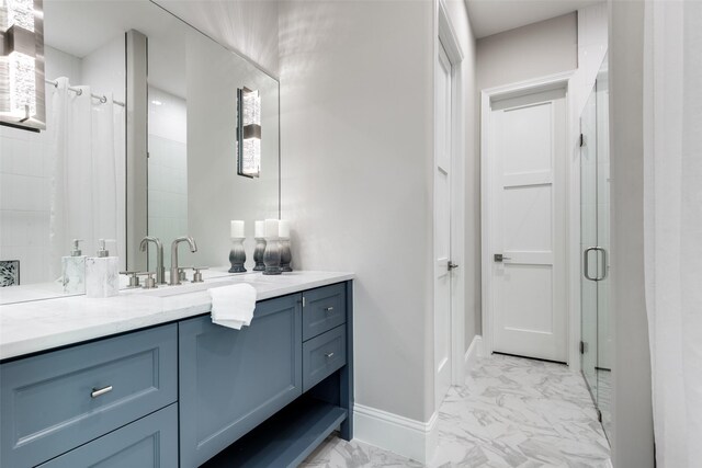 bathroom with vanity and walk in shower