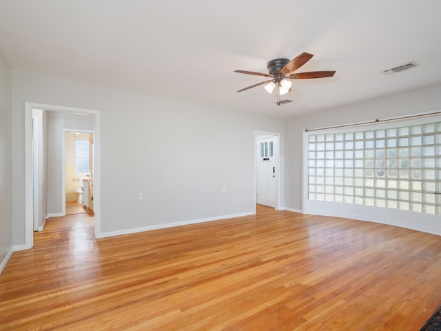 unfurnished room with ceiling fan and light hardwood / wood-style flooring