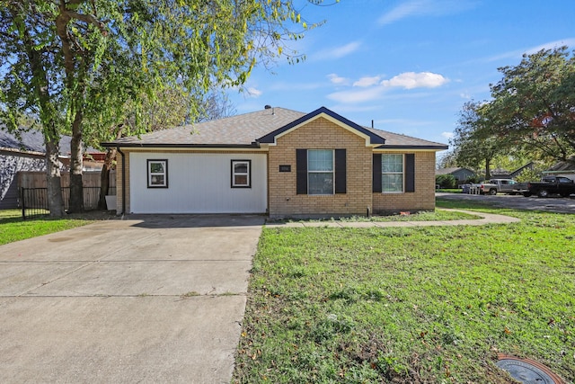 ranch-style home with a front yard