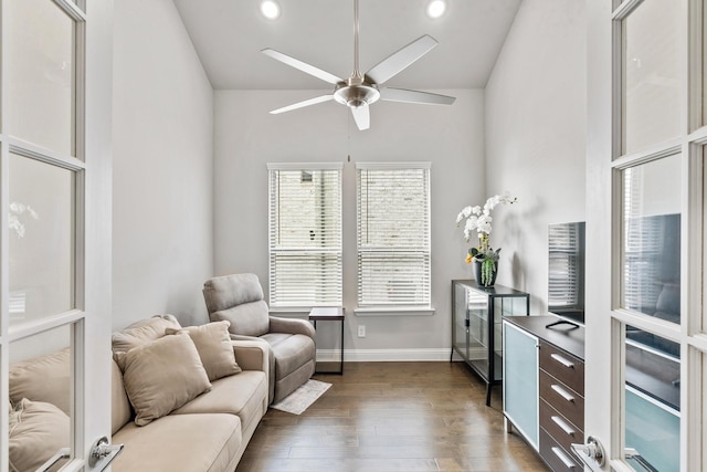 interior space featuring dark wood-type flooring, baseboards, ceiling fan, lofted ceiling, and recessed lighting