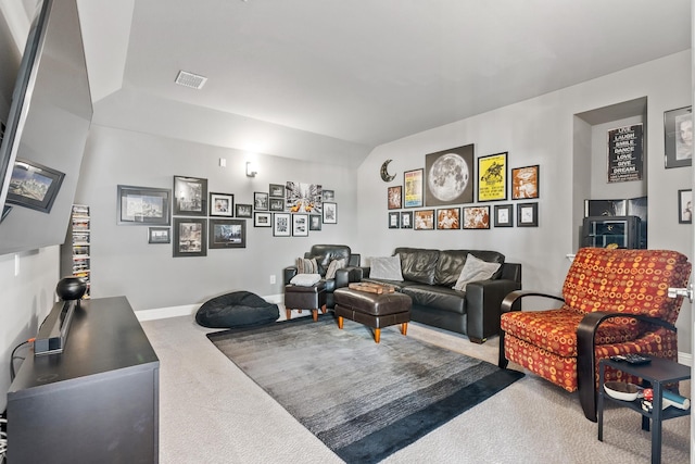 carpeted living room with baseboards and visible vents