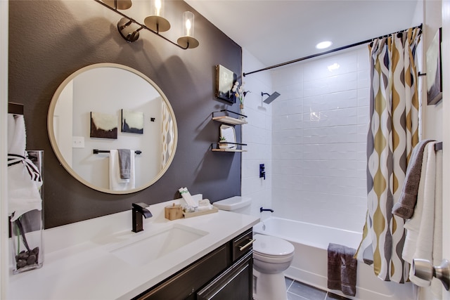 full bathroom featuring tile patterned floors, shower / bath combo, toilet, and vanity