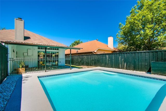 view of pool featuring a patio