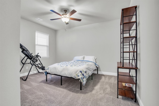 bedroom with ceiling fan and carpet