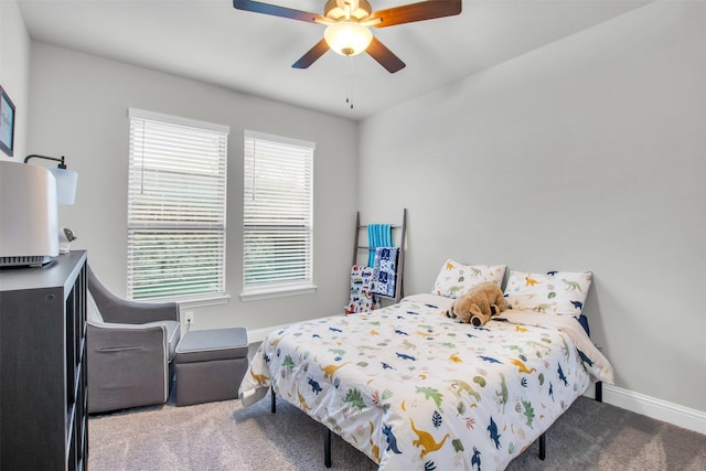 bedroom featuring ceiling fan and carpet floors