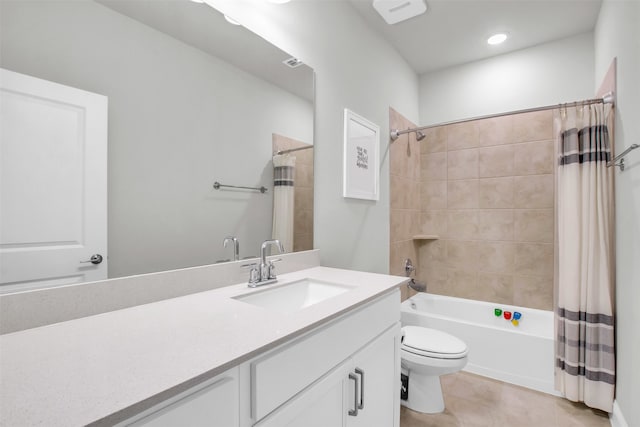 full bathroom featuring tile patterned floors, shower / bath combo, toilet, and vanity