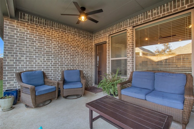 view of patio / terrace featuring ceiling fan and an outdoor living space