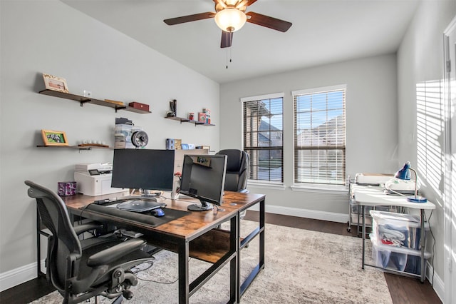 office space with dark hardwood / wood-style floors and ceiling fan