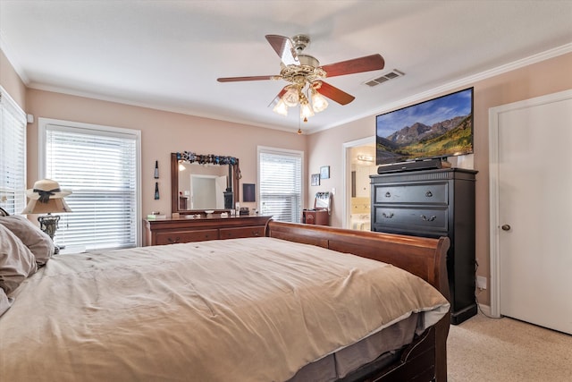 bedroom with ceiling fan, light colored carpet, crown molding, and multiple windows