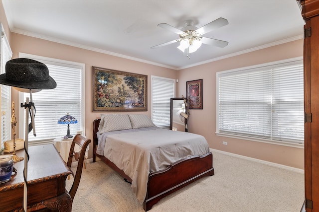 bedroom featuring ceiling fan, light colored carpet, and ornamental molding