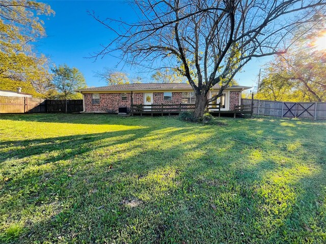 view of yard featuring a deck