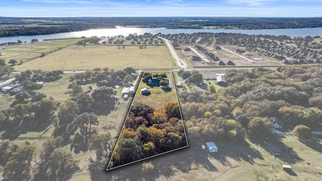 aerial view featuring a water view and a rural view