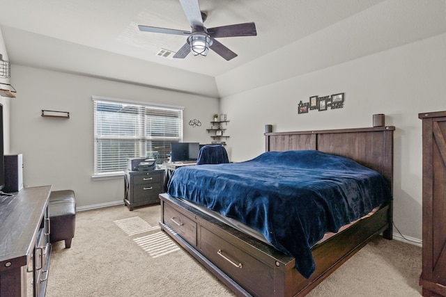 carpeted bedroom with ceiling fan and lofted ceiling