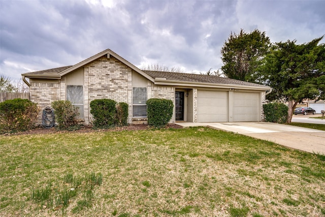 single story home with a front yard and a garage