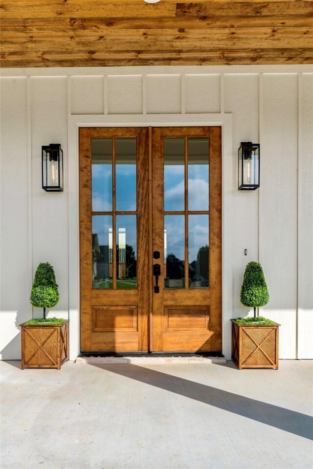 property entrance featuring french doors