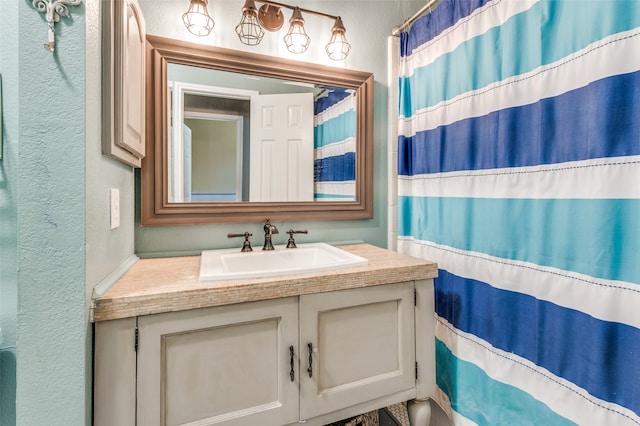 bathroom featuring vanity and walk in shower