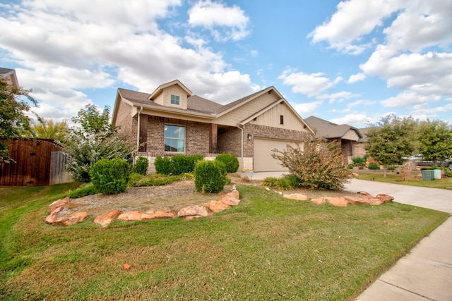 craftsman-style home featuring a front yard and a garage