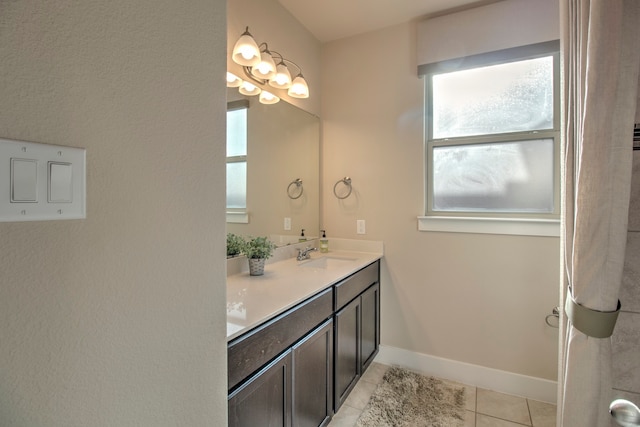 bathroom featuring tile patterned floors and vanity