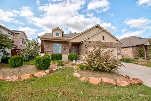 view of front of home featuring a garage and a front lawn