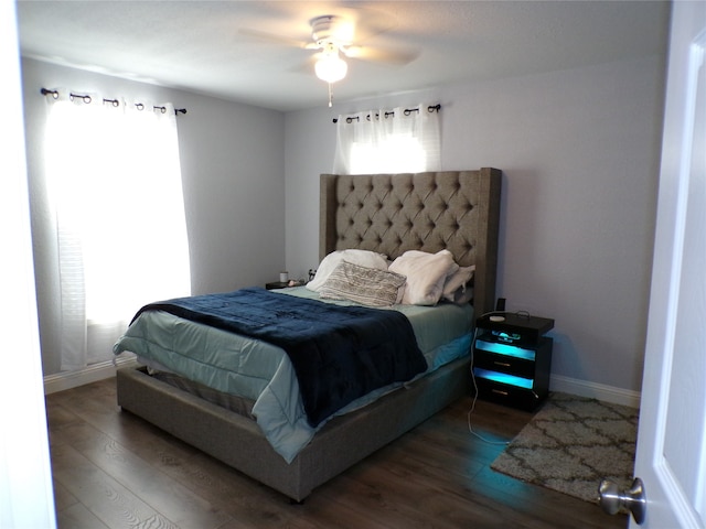 bedroom featuring hardwood / wood-style flooring and ceiling fan