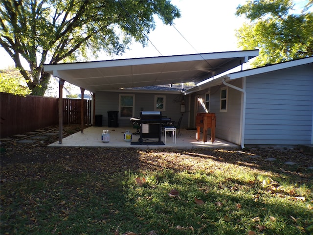 back of property featuring a patio area