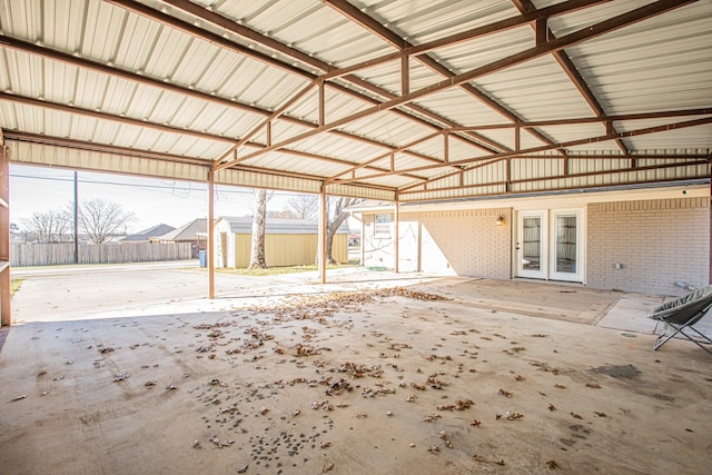 view of patio with a storage shed