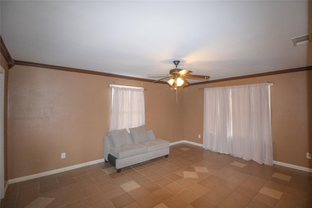 332 NW County Road 2005, Corsicana, TX 75110 - unfurnished room featuring crown molding, ceiling fan, and baseboards